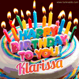 A colorful birthday cake topped with lit candles, with the words 'Happy Birthday Klarissa' in bold glowing letters on a burgundy background. Animated flames add a festive touch.