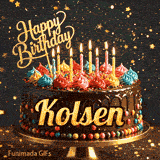 A decorated chocolate birthday cake on a golden stand with lit candles and colorful whipped cream rosettes, personalized for Kolsen.