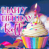 A festive animated GIF featuring a colorful cupcake with a single lit candle, sprinkles, and 'Happy Birthday Kolt' text against a sparkling, celebratory background.