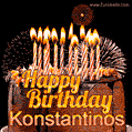 A rich chocolate cake topped with glowing birthday candles and surrounded by bright fireworks. The animated GIF displays the message 'Happy Birthday Konstantinos' in golden text.
