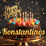 Golden lettering spelling Konstantinos on a rich chocolate birthday cake decorated with rainbow sprinkles.