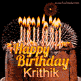 A rich chocolate cake topped with glowing birthday candles and surrounded by bright fireworks. The animated GIF displays the message 'Happy Birthday Krithik' in golden text.