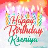 Bright birthday candles with rainbow flames on a cake, alongside the text 'Happy Birthday Kseniya' in vibrant script in this celebratory animated GIF.