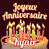 A Happy Birthday GIF in French featuring a festive birthday cake adorned with bright candles and the glowing text 'Joyeux Anniversaire Kyair' in a cheerful style.