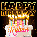 A vibrant animated GIF featuring a delicious birthday cake topped with glowing candles and the name 'Kylian' in elegant script, and the words 'Happy Birthday' on the black background.