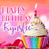 A vibrant birthday GIF featuring a rainbow-colored cupcake topped with white frosting, sprinkles, and a lit candle. The text reads 'Happy Birthday Kynslee' in bold pink and violet letters with white outline.