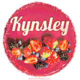 Beautifully decorated red velvet berry birthday cake with vibrant fruits and a glowing 'Kynsley' name, adding a touch of sweetness and sparkle.