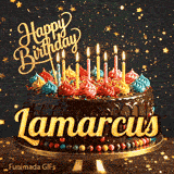 Shimmering golden particles around a chocolate frosted birthday cake with lit candles and the name Lamarcus.