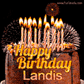 A rich chocolate cake topped with glowing birthday candles and surrounded by bright fireworks. The animated GIF displays the message 'Happy Birthday Landis' in golden text.