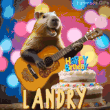 Animated birthday GIF showing a capybara playing guitar and singing beside a birthday cake with the name Landry in large letters and colorful bokeh lights in the background.