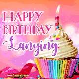 A vibrant birthday GIF featuring a rainbow-colored cupcake topped with white frosting, sprinkles, and a lit candle. The text reads 'Happy Birthday Lanying' in bold pink and violet letters with white outline.