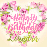 A stunning heart made of pink roses surrounds the elegant script text 'Happy Birthday Leandra' on a soft beige background. Animated sparkles add a magical and festive feel.