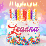 A cheerful white birthday cake with multicolor sprinkles, lit candles, and 'Leanna' written in vibrant letters, in an animated GIF.