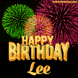 A captivating GIF with bursts of green, pink, and orange fireworks lighting up the night sky, accompanied by 'Happy Birthday Lee' in glowing golden text.