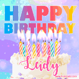 A vibrant animated name GIF with the words 'Happy Birthday Leidy' with colorful candles on a creamy cake. The background sparkles with pastel shades, adding a festive touch.
