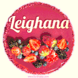 Beautifully decorated red velvet berry birthday cake with vibrant fruits and a glowing 'Leighana' name, adding a touch of sweetness and sparkle.