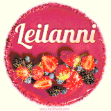 Beautifully decorated red velvet berry birthday cake with vibrant fruits and a glowing 'Leilanni' name, adding a touch of sweetness and sparkle.