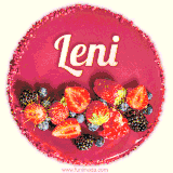 Beautifully decorated red velvet berry birthday cake with vibrant fruits and a glowing 'Leni' name, adding a touch of sweetness and sparkle.