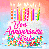 A white birthday cake covered in colorful sprinkles, topped with bright candles, and French text 'Bon Anniversaire Lesli' on a pastel gradient background in an animated GIF.