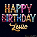 Vibrant luxury birthday greeting card for Leslie, showing glittering gemstone letters and golden calligraphy on a dark background with twinkling shine effects.