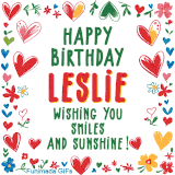 A colorful animated card for Leslie’s birthday featuring playful hearts, cheerful flowers, and a handwritten message wishing smiles and sunshine.