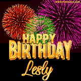 A golden 'Happy Birthday Lesly' message with vibrant fireworks in the background, creating a festive and celebratory vibe in this animated name GIF.
