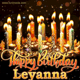 A glowing personalized birthday GIF with name Leyanna featuring lit candles with intricate designs, warm lighting, and the text 'Happy Birthday' in an elegant font.