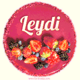 Beautifully decorated red velvet berry birthday cake with vibrant fruits and a glowing 'Leydi' name, adding a touch of sweetness and sparkle.