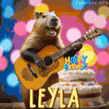 Animated birthday GIF showing a capybara playing guitar and singing beside a birthday cake with the name Leyla in large letters and colorful bokeh lights in the background.