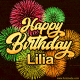 Golden text reading 'Happy Birthday Lilia' surrounded by vibrant fireworks in red, green, and yellow, set against a dark background in this celebratory birthday GIF.