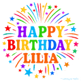 Happy Birthday Lilia' GIF with rainbow-colored letters, colorful stars, and fireworks on white background.