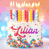 A cheerful white birthday cake with multicolor sprinkles, lit candles, and 'Lilian' written in vibrant letters, in an animated GIF.