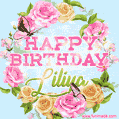 A charming animated GIF featuring 'Happy Birthday Liliya' in pink and green text, surrounded by delicate roses, leaves, and fluttering butterflies on a soft light blue pastel background.