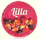 Beautifully decorated red velvet berry birthday cake with vibrant fruits and a glowing 'Lilla' name, adding a touch of sweetness and sparkle.