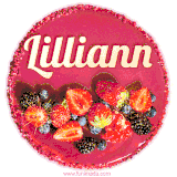 Beautifully decorated red velvet berry birthday cake with vibrant fruits and a glowing 'Lilliann' name, adding a touch of sweetness and sparkle.