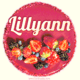 Beautifully decorated red velvet berry birthday cake with vibrant fruits and a glowing 'Lillyann' name, adding a touch of sweetness and sparkle.