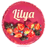 Beautifully decorated red velvet berry birthday cake with vibrant fruits and a glowing 'Lilya' name, adding a touch of sweetness and sparkle.
