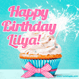 A festive cupcake with pink icing, a gingham bow, and a lit animated sparkler, paired with 'Happy Birthday Lilya!' in bright pink text.