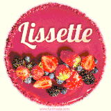 Beautifully decorated red velvet berry birthday cake with vibrant fruits and a glowing 'Lissette' name, adding a touch of sweetness and sparkle.