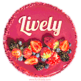 Beautifully decorated red velvet berry birthday cake with vibrant fruits and a glowing 'Lively' name, adding a touch of sweetness and sparkle.
