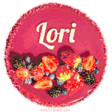 Beautifully decorated red velvet berry birthday cake with vibrant fruits and a glowing 'Lori' name, adding a touch of sweetness and sparkle.