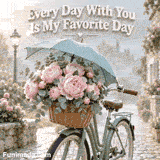A scenic animated romantic GIF featuring a mint green vintage bicycle on a cobblestone street with a large basket of pink peony flowers covered by a rainy teal umbrella below the quote Every Day With You Is My Favorite Day.