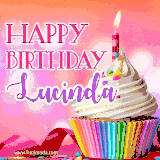 A vibrant birthday GIF featuring a rainbow-colored cupcake topped with white frosting, sprinkles, and a lit candle. The text reads 'Happy Birthday Lucinda' in bold pink and violet letters with white outline.