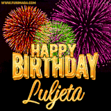A golden 'Happy Birthday Luljeta' message with vibrant fireworks in the background, creating a festive and celebratory vibe in this animated name GIF.