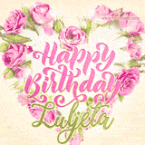 A stunning heart made of pink roses surrounds the elegant script text 'Happy Birthday Luljeta' on a soft beige background. Animated sparkles add a magical and festive feel.