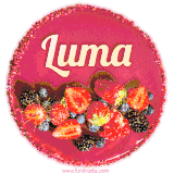 Beautifully decorated red velvet berry birthday cake with vibrant fruits and a glowing 'Luma' name, adding a touch of sweetness and sparkle.