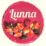 Beautifully decorated red velvet berry birthday cake with vibrant fruits and a glowing 'Lunna' name, adding a touch of sweetness and sparkle.