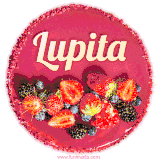 Beautifully decorated red velvet berry birthday cake with vibrant fruits and a glowing 'Lupita' name, adding a touch of sweetness and sparkle.