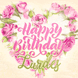 A stunning heart made of pink roses surrounds the elegant script text 'Happy Birthday Lurdes' on a soft beige background. Animated sparkles add a magical and festive feel.