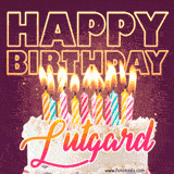 A colorful birthday cake topped with lit candles, with the words 'Happy Birthday Lutgard' in bold glowing letters on a burgundy background. Animated flames add a festive touch.